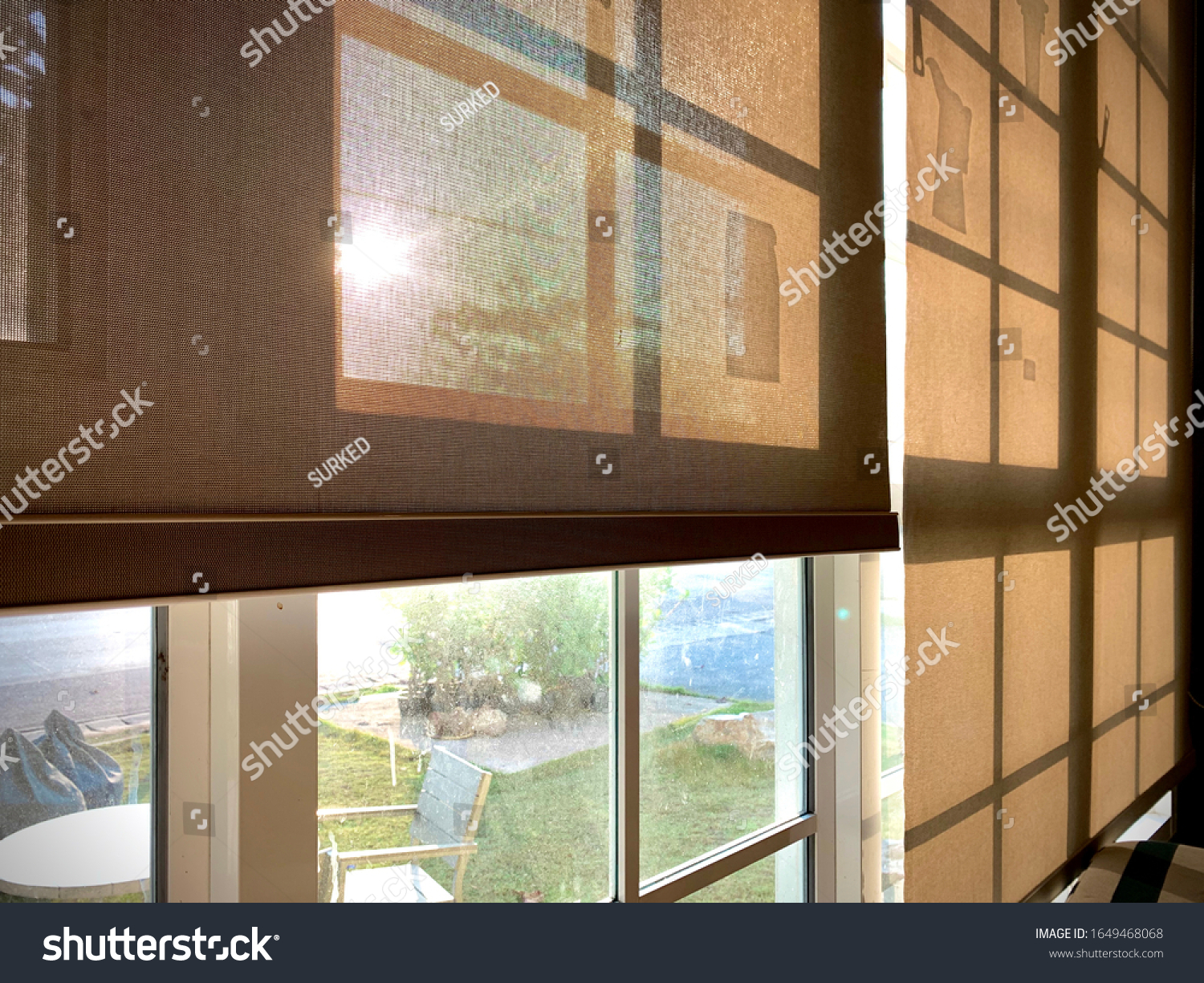 stock-photo-modern-blinds-traditional-home-decoration-sunlight-coming-through-blinds-by-the-window-curtain-at-1649468068